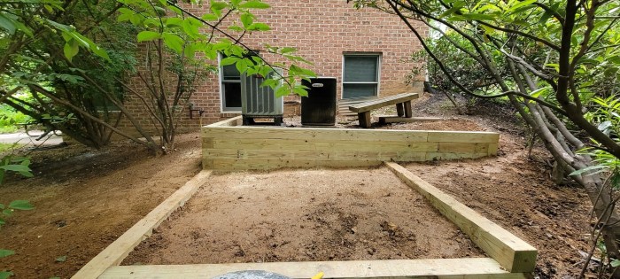 Arbor rock and wall landscaping